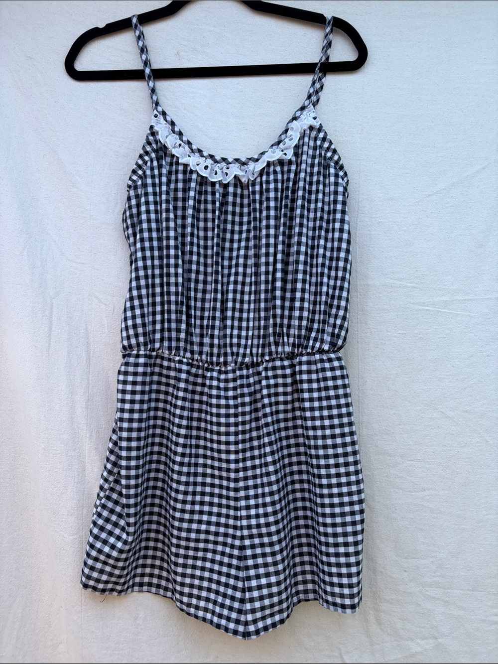 Black and White Gingham Sleeveless Romper with Lace Trim